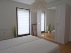 Schlafzimmer Ansicht 2 - Modern möblierte 2,5 Zimmer Wohnung mit EBK und Balkon in Oberkochen ab sofort frei